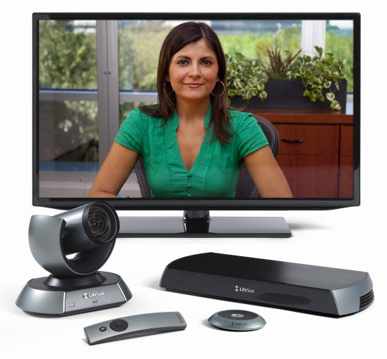 LifeSize ICON with lady in green top on screen. Displayed with LifeSize camera, micpod, icon codec and remote control.