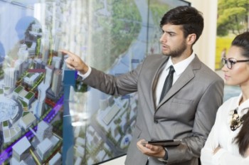Man Training woman with presentation