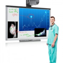 SMART board showing xrays and medical information with doctor stood in front