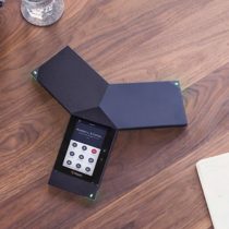 Polycom RealPresence Trio Voice and Audio device in centre of table